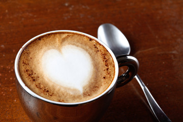 art latte on a cappuccino coffee cup