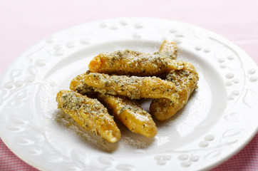 Boiled noodles made of mushed pumpkin with parmesan cheese