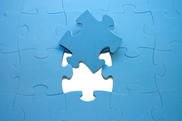 Dropped out part of a blue puzzle