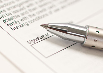 Stylish pen signing a contract