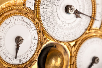 Detail of gold and white historic clock