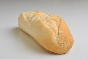 fresh baked bread roll on a bright background