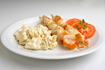 fresh home made potato salad with salmon shashlik