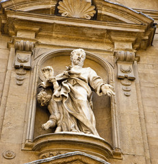 Obraz premium Statue of Priest and Angel