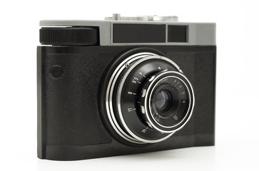 old antique analog photo camera isolated on white