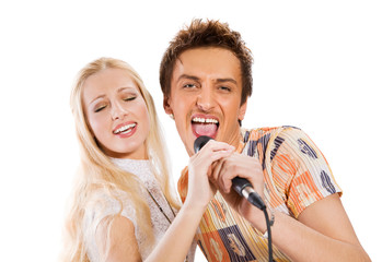 Attractive young couple singing, isolated on white background