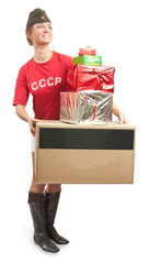 girl in overseas cap with coloured shopping bags