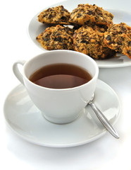 hot tea cup with fresh cookie
