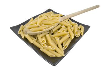 wooden spoon and pasta on plate isolated on white