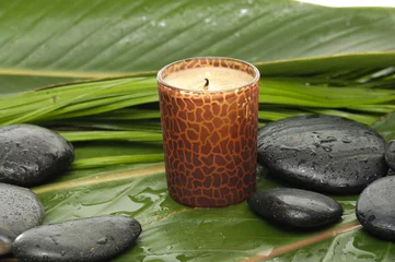 Foto op Canvas Relaxing spa with candle and fresh leaf © Mee Ting