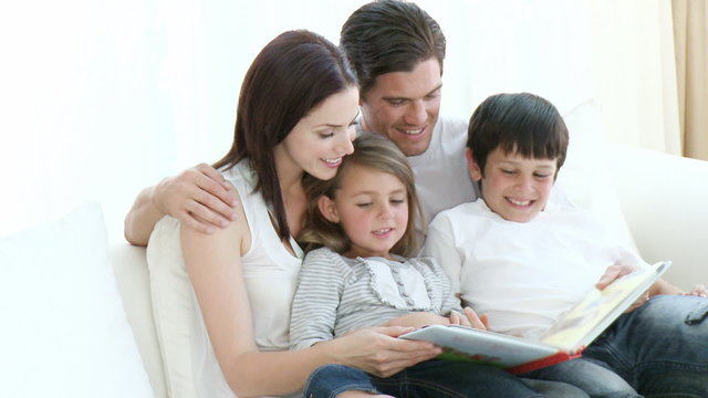 Happy family reading all together