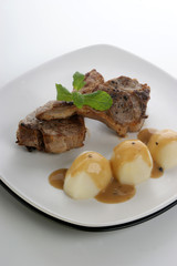 organic grilled lamb chop with potato on a plate