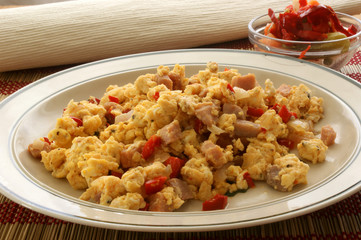 scrambled eggs with organic tomato and bacon
