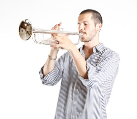 young man playing the trumpet