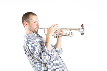 young man playing the trumpet