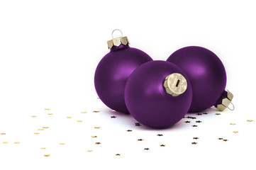 drei Weihnachtskugeln - violett