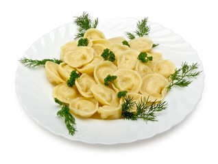 Meat dumplings with dill and parsley isolated on white