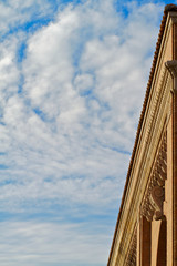 Building edge blue sky clouds