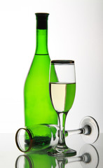 Two wineglass and bottle white wine