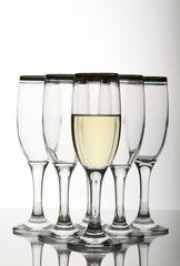 Wine goblets on mirror table