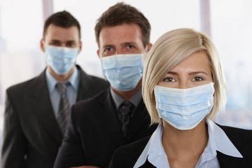 Business people fearing h1n1 virus