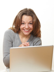 young beauty working with her laptop