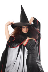 Beautiful young witch for Halloween