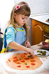 Girl cooking pizza
