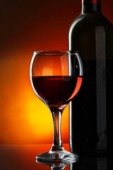 Glass and bottle of red wine