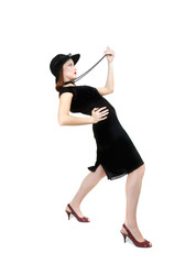 attractive woman in black dress and hat over white