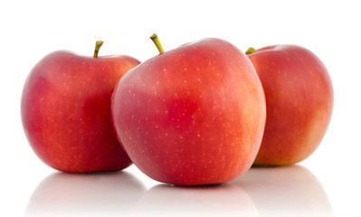 Three red apples