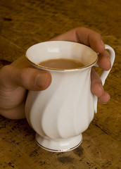 drinking cup of tea close-up