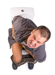 man with Intestinal problems sitting on the toilet