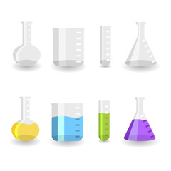Different chemistry beakers empty and full with colored liquids