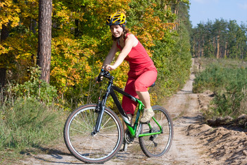 Fototapeta premium Girl biking