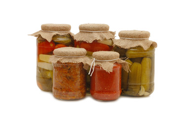 Glass jars with tinned vegetables isolated