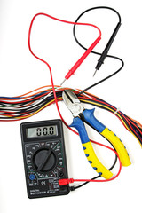 Electrician set - multimeter, cutters and multicolored wires