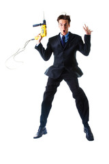 jumping businessman holding drill