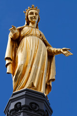 Fototapeta premium Golden Statue of Virgin Mary / Saint Mary / Our Lady