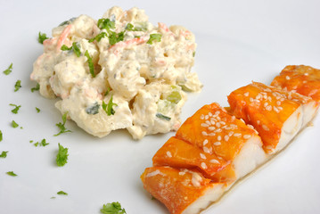 fresh home made potato salad with salmon steak