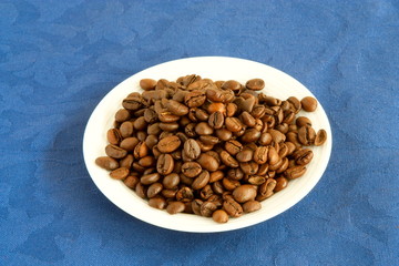 Coffee beans in white plate