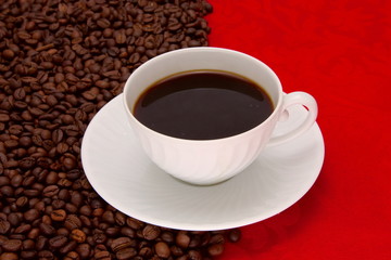 Coffee cup over red background