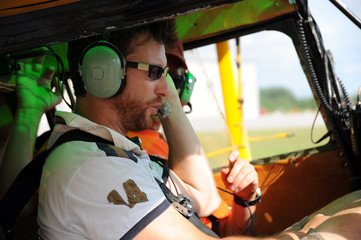 Two pilots testing the radio