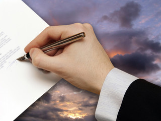 Signature of Business Contract on the dramatically Sky