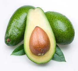 Avocado with leaves on a white background