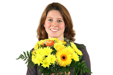 lächelnde, glückliche Geschäftsfrau mit Blumenstrauss