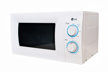 Fototapeta premium Microwave oven isolated on white background