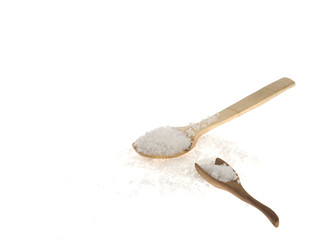 Two laddles with salt