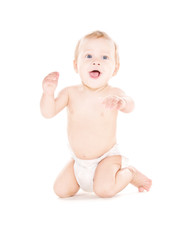 sitting baby boy in diaper
