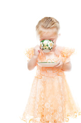 Little girl with cup of tea